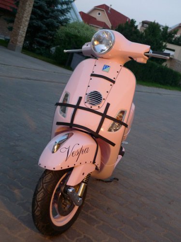Культовый итальянский мотороллер Vespa производится концерном Piaggio