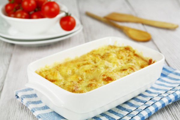 Запеченные пельмени под сыром