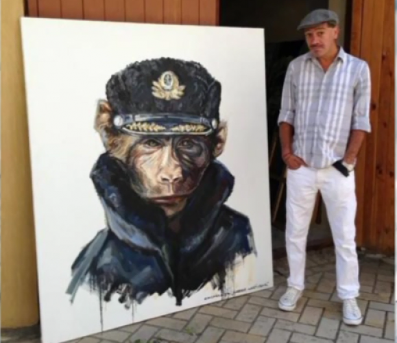 Илья Чичкан с картиной Путин tsn.ua